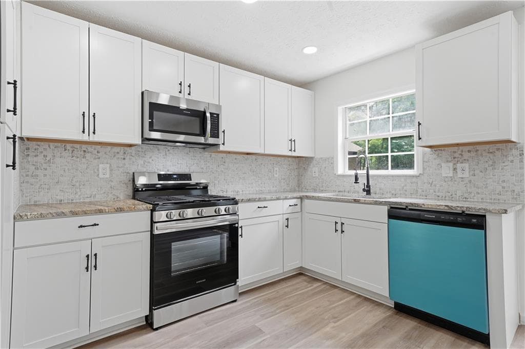 5 bedroom, 3 bathroom, 2,220 sq ft single family residence for sale at 483 Mephisto Circle, Lawrenceville, GA 30046 — photo 9