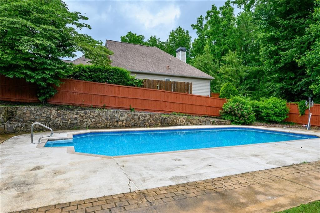 6 bedroom, 4 bathroom, 3,933 sq ft single family residence for sale at 2426 Watercrest Terrace, Acworth, GA 30101 — photo 3