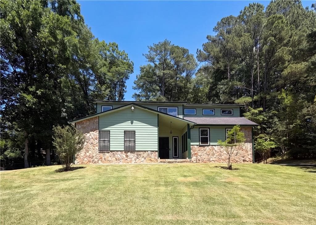 4 bedroom, 3 bathroom, 1,378 sq ft single family residence for sale at 6830 Earlhurst Road, Atlanta, GA 30349
