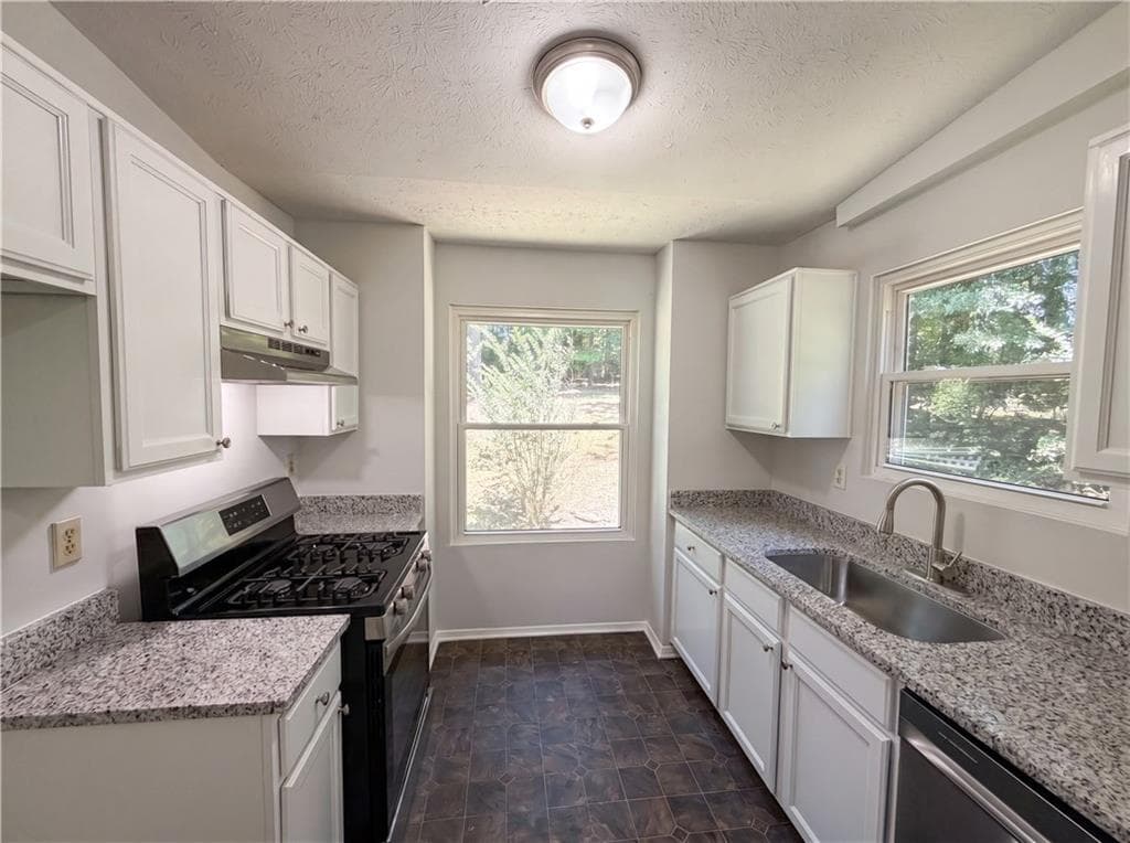 4 bedroom, 3 bathroom, 1,378 sq ft single family residence for sale at 6830 Earlhurst Road, Atlanta, GA 30349 — photo 8