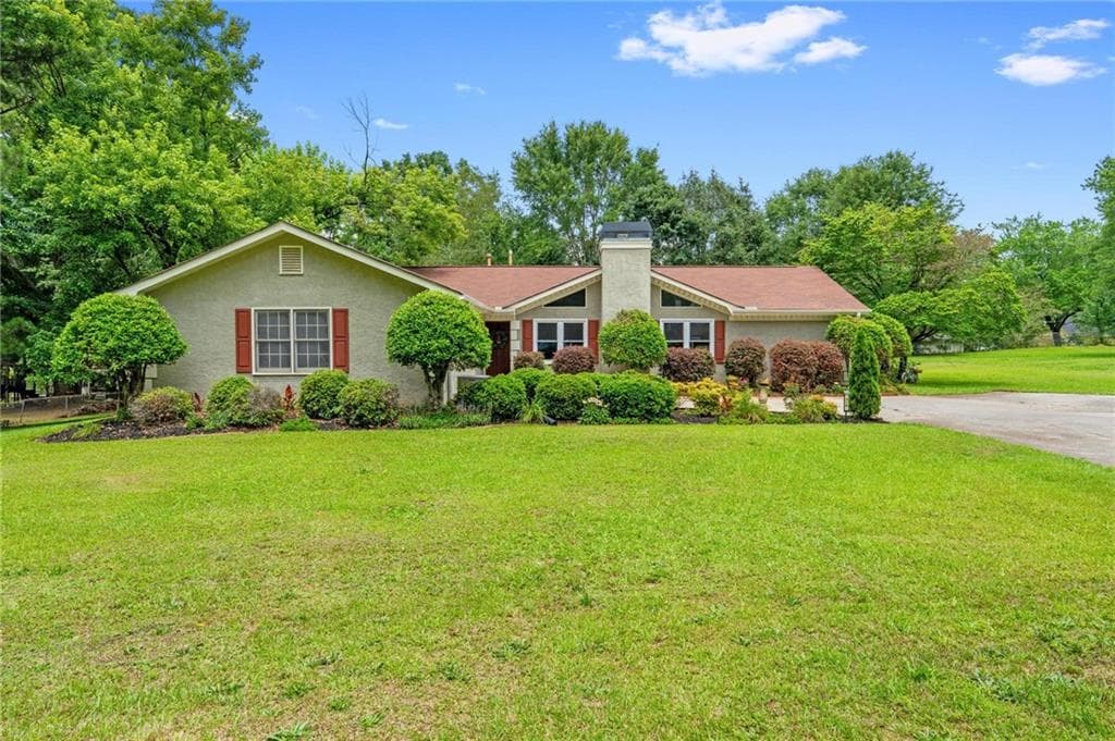 3 bedroom, 2 bathroom single family residence sold at 310 Cowan Road, Conyers, GA 30094