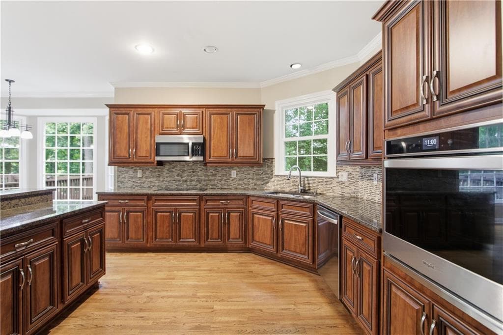 5 bedroom, 3 bathroom, 3,626 sq ft single family residence for sale at 11715 Dunhill Place Drive, Johns Creek, GA 30005 — photo 2