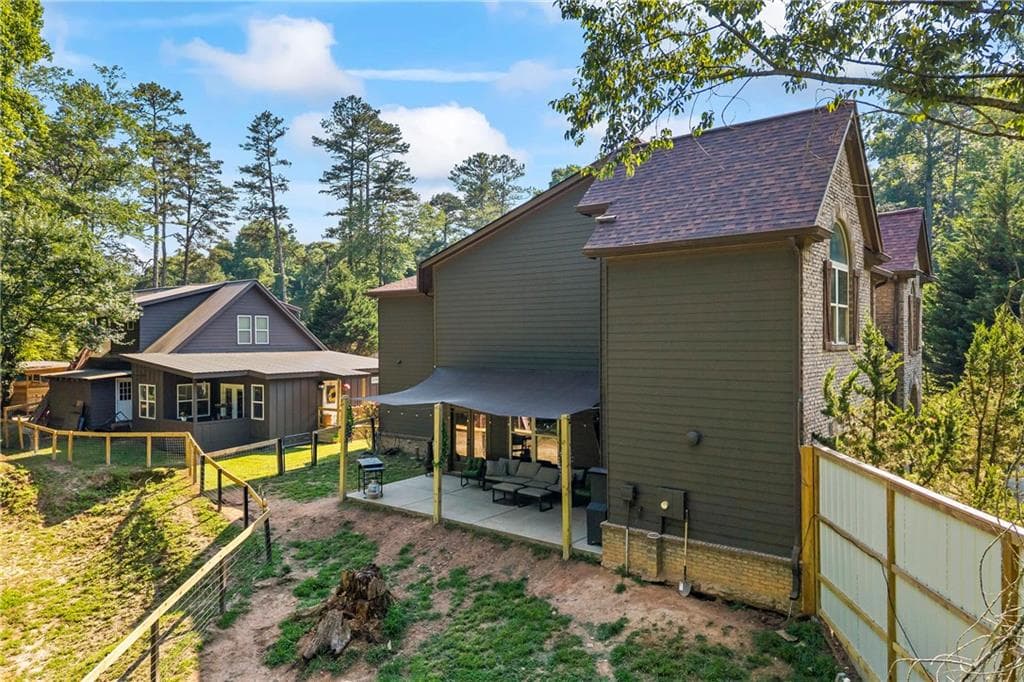 7 bedroom, 7 bathroom, 3,171 sq ft single family residence for sale at 9315 Meadow Brook Drive, Gainesville, GA 30506 — photo 3