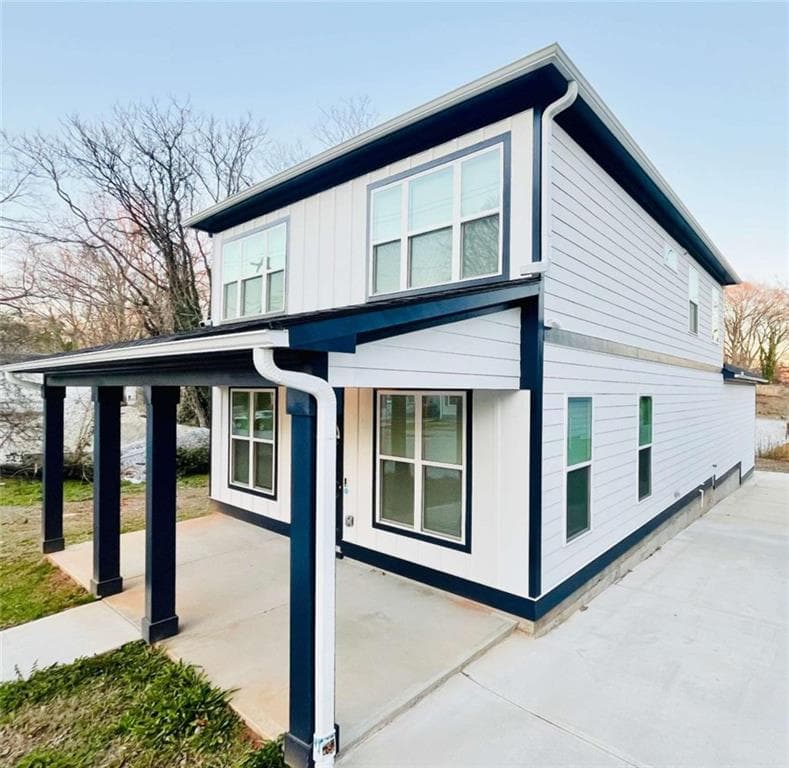 4 bedroom, 3 bathroom, 1,661 sq ft single family residence for sale at 445 Griffin Street, Atlanta, GA 30318 — photo 1 of 14