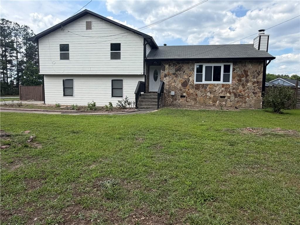 3 bedroom, 2 bathroom, 31,363 sq ft single family residence for sale at 1861 Pharr Road, Snellville, GA 30078 — photo 3