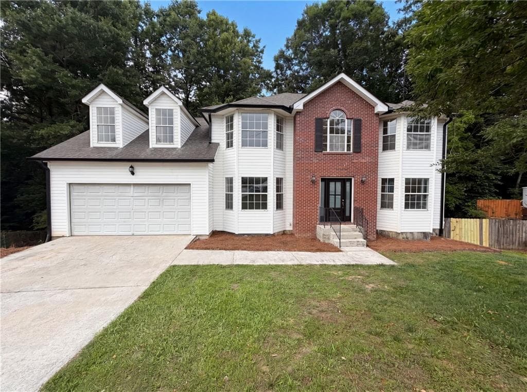 5 bedroom, 3 bathroom, 3,912 sq ft single family residence for sale at 1800 Ivy Stone Court, Buford, GA 30519 — photo 1 of 48