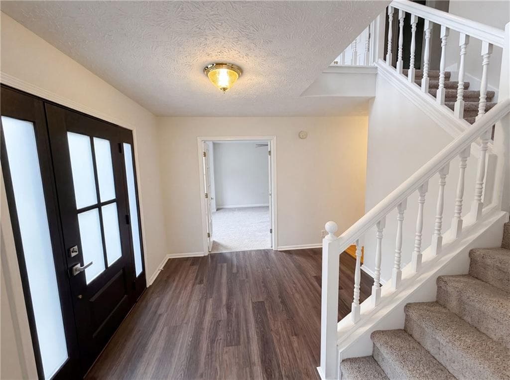 5 bedroom, 3 bathroom, 3,912 sq ft single family residence for sale at 1800 Ivy Stone Court, Buford, GA 30519 — photo 7