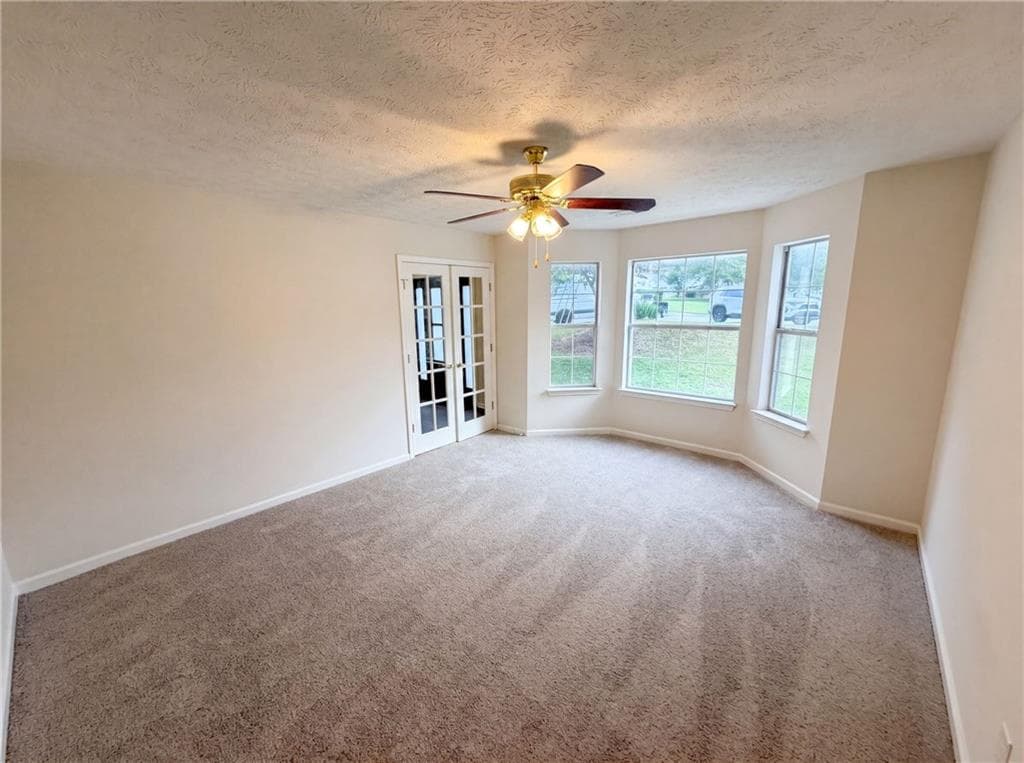 5 bedroom, 3 bathroom, 3,912 sq ft single family residence for sale at 1800 Ivy Stone Court, Buford, GA 30519 — photo 9
