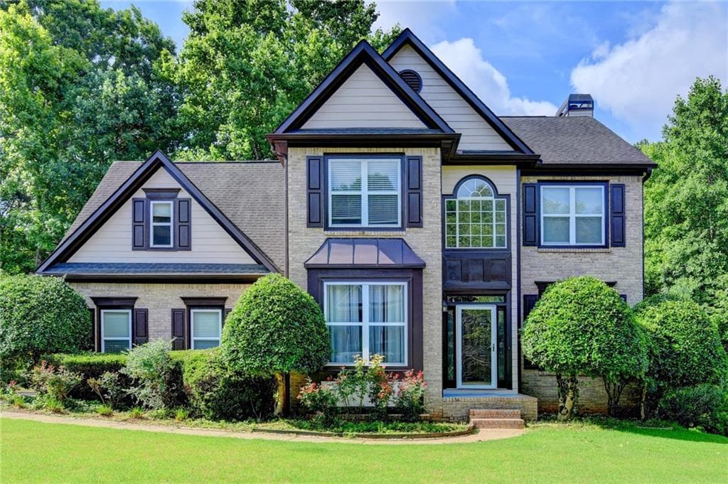 7 bedroom, 4 bathroom, 3,266 sq ft single family residence for sale at 365 Ruby Forest Parkway, Suwanee, GA 30024