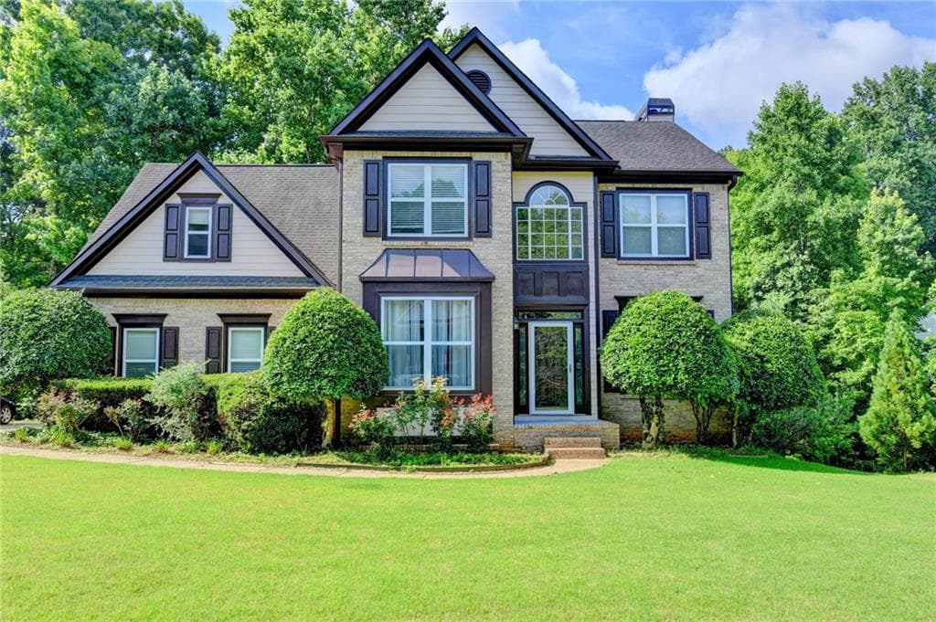 7 bedroom, 4 bathroom, 3,266 sq ft single family residence for sale at 365 Ruby Forest Parkway, Suwanee, GA 30024 — photo 2