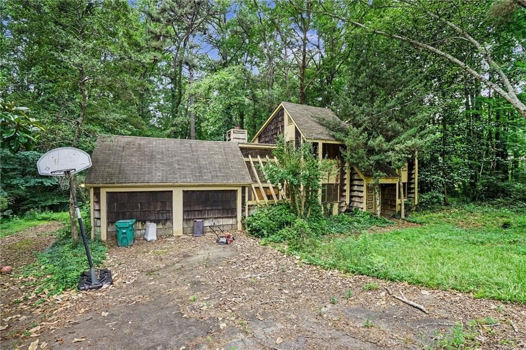 4 bedroom, 3 bathroom, 2,164 sq ft single family residence sold at 5230 Essex Farms Court, Stone Mountain, GA 30088