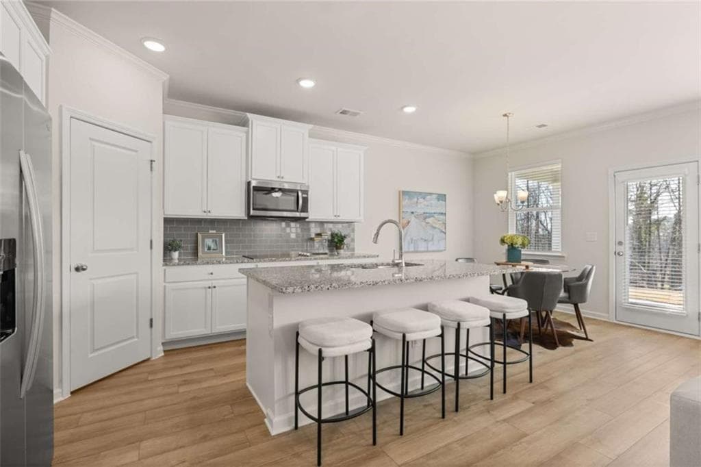 5 bedroom, 4 bathroom, 2,892 sq ft single family residence for sale at 1776 Kingsmere Run Drive, Loganville, GA 30052 — photo 7