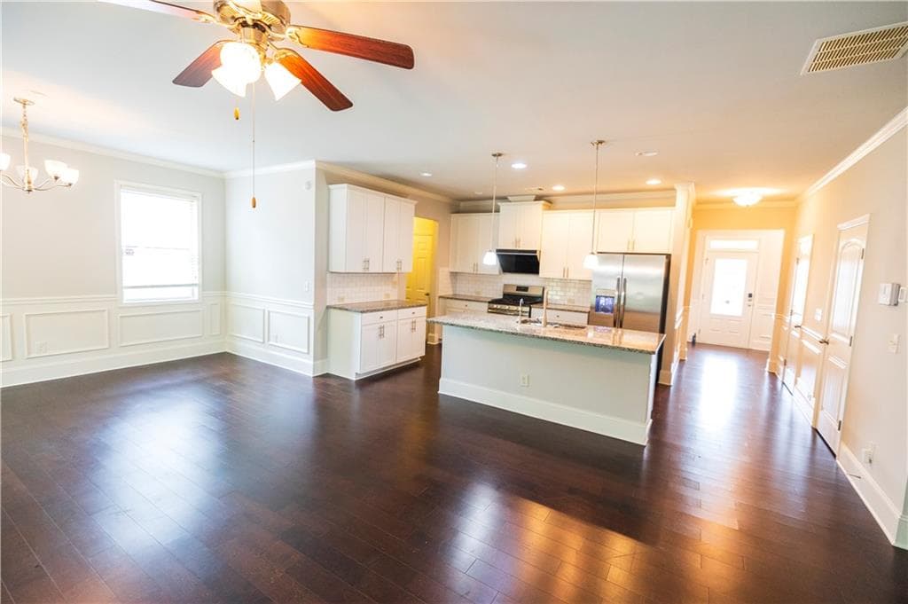 4 bedroom, 3 bathroom, 2,344 sq ft single family residence for sale at 4115 Huron Drive, Cumming, GA 30028 — photo 4