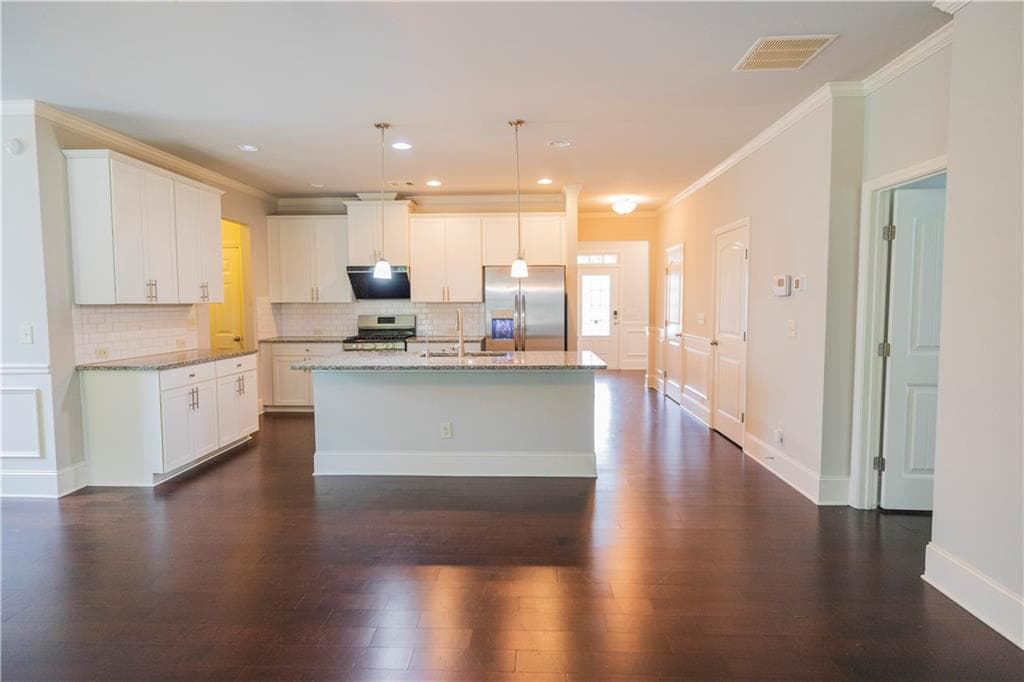 4 bedroom, 3 bathroom, 2,344 sq ft single family residence for sale at 4115 Huron Drive, Cumming, GA 30028 — photo 6