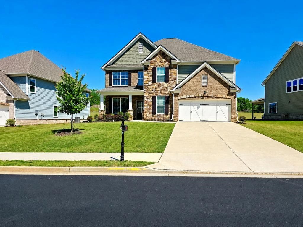 5 bedroom, 4 bathroom, 3,430 sq ft single family residence for sale at 4055 Harvest Moon Court, Cumming, GA 30028 — photo 1 of 23