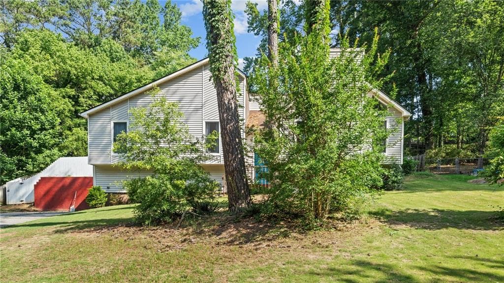 4 bedroom, 3 bathroom, 1,573 sq ft single family residence for sale at 3291 Rae Place, Lawrenceville, GA 30044 — photo 3