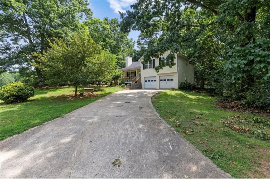 3 bedroom, 2 bathroom, 1,359 sq ft single family residence for sale at 7130 Bristol Trail, Cumming, GA 30028 — photo 2