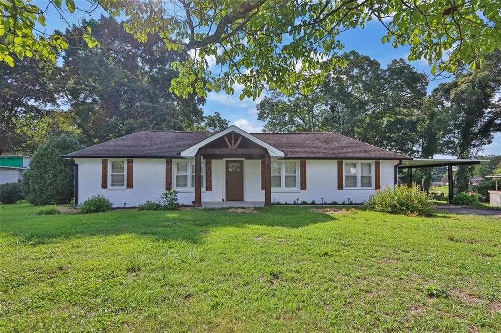 4 bedroom, 2 bathroom, 1,674 sq ft single family residence for sale at 123 Cowan Road, Covington, GA 30016 — photo 2