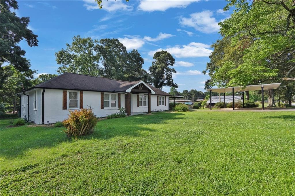 4 bedroom, 2 bathroom, 1,674 sq ft single family residence for sale at 123 Cowan Road, Covington, GA 30016 — photo 3