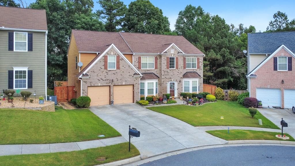 4 bedroom, 3 bathroom, 3,379 sq ft single family residence for sale at 1180 Lexus Court, Lawrenceville, GA 30045 — photo 2