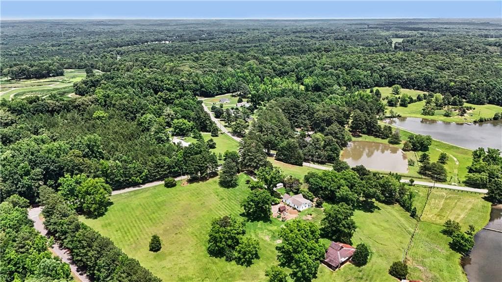 3 bedroom, 2 bathroom, 1,820 sq ft single family residence for sale at 355 Inman Road, Hampton, GA 30228 — photo 2
