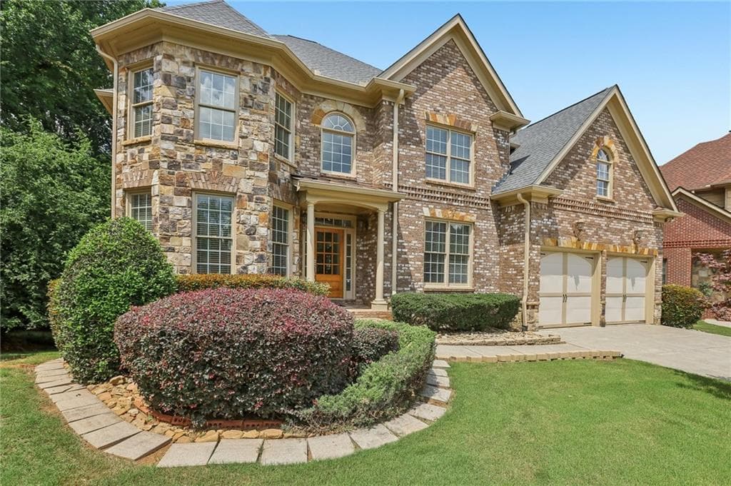 6 bedroom, 5 bathroom, 5,815 sq ft single family residence for sale at 12516 Darvish Lane, Alpharetta, GA 30005 — photo 2