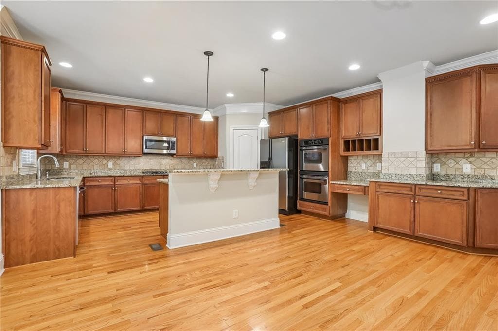 6 bedroom, 5 bathroom, 5,815 sq ft single family residence for sale at 12516 Darvish Lane, Alpharetta, GA 30005 — photo 9