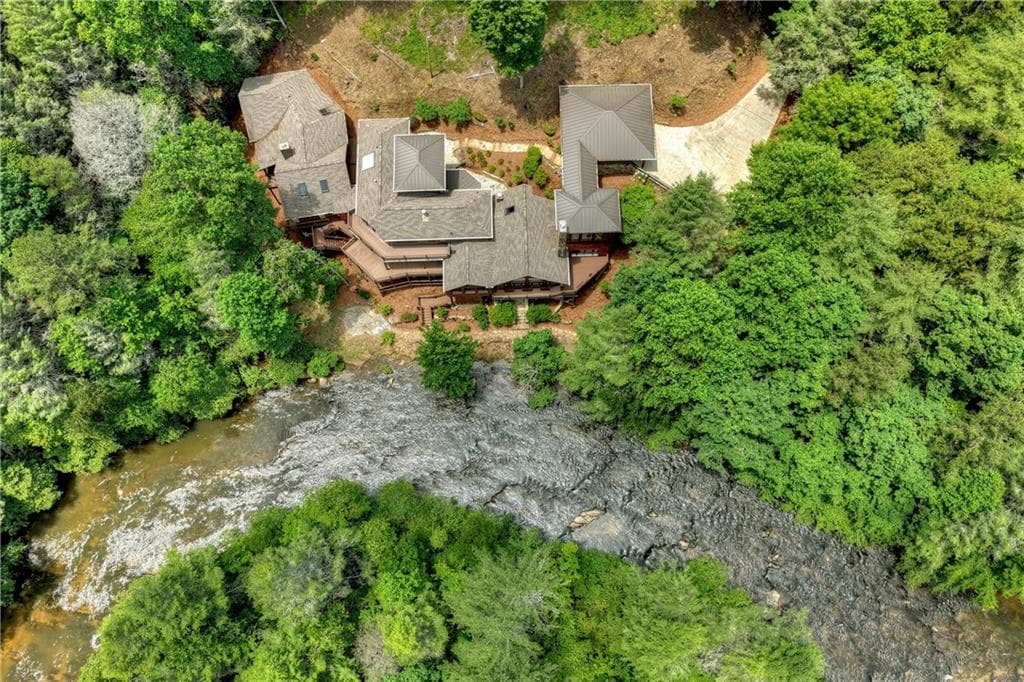5 bedroom, 7 bathroom, 8,142 sq ft single family residence for sale at 192 Delphi Hills Lane, Mccaysville, GA 30555 — photo 6