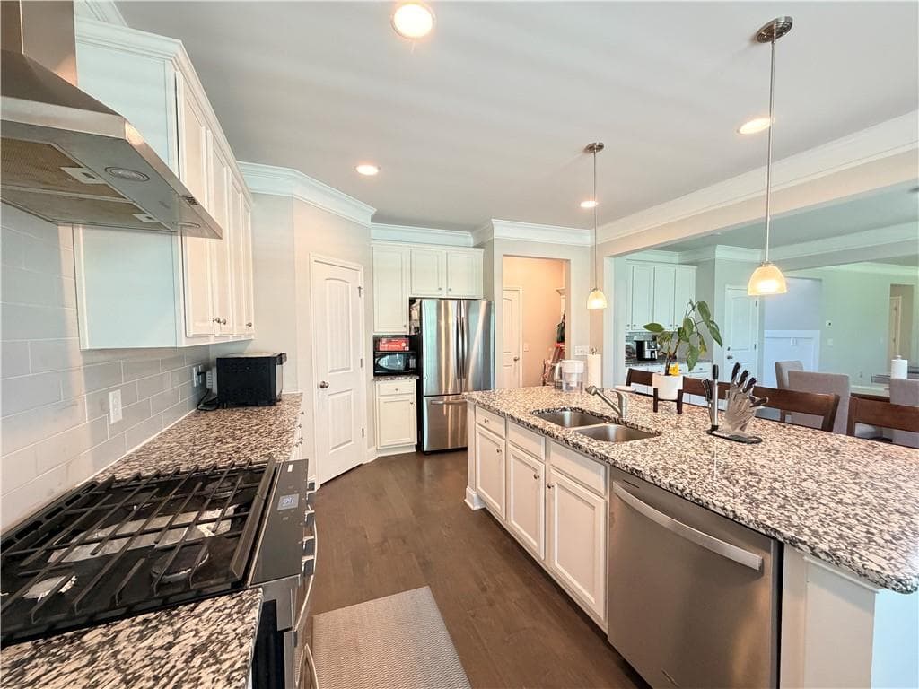 4 bedroom, 3 bathroom, 3,040 sq ft single family residence for sale at 5100 Woodline View Circle, Auburn, GA 30011 — photo 7