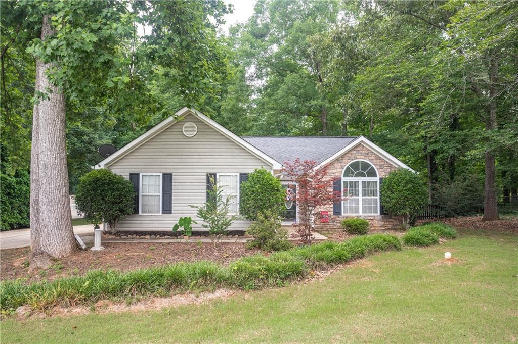 3 bedroom, 2 bathroom, 1,563 sq ft single family residence for sale at 605 Freeman Drive, Covington, GA 30016 — photo 1 of 34