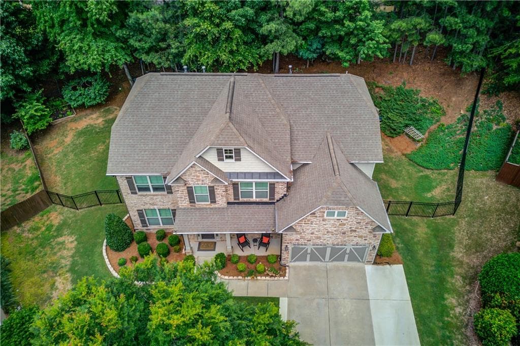 6 bedroom, 4 bathroom, 3,646 sq ft single family residence for sale at 6005 Deer Walk Trail, Sugar Hill, GA 30518 — photo 2