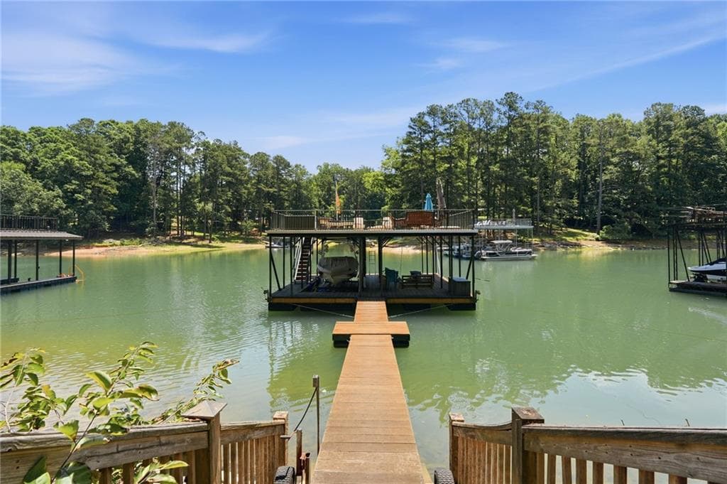 5 bedroom, 6 bathroom, 7,060 sq ft single family residence for sale at 6029 Shadburn Ferry Road, Buford, GA 30518 — photo 4