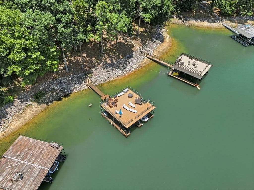 5 bedroom, 6 bathroom, 7,060 sq ft single family residence for sale at 6029 Shadburn Ferry Road, Buford, GA 30518 — photo 6