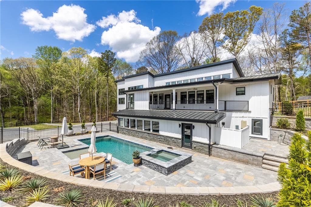 6 bedroom, 6 bathroom, 8,632 sq ft single family residence sold at 3350 Wildwood Road, Suwanee, GA 30024