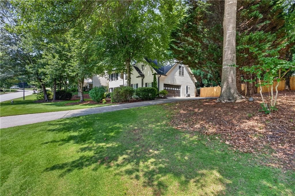5 bedroom, 3 bathroom, 2,660 sq ft single family residence for sale at 4379 Depot Ridge Court, Buford, GA 30518 — photo 3