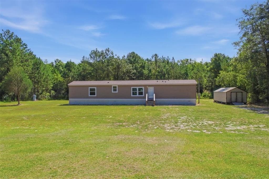 3 bedroom, 2 bathroom, 1,216 sq ft single family residence for sale at 2720 John Wells Road, Hinesville, GA 31313 — photo 2