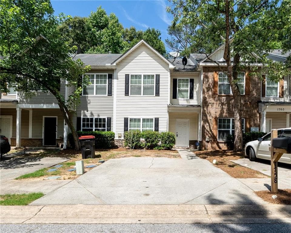 2 bedroom, 3 bathroom, 1,384 sq ft townhouse for rent at 1758 Broad River Road, Atlanta, GA 30349 for $1,650 a month — photo 1 of 21