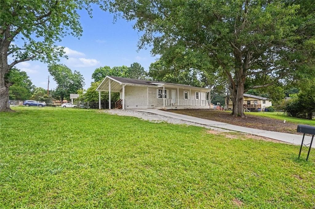 3 bedroom, 2 bathroom, 1,196 sq ft single family residence for sale at 1394 Almand Creek Drive, Conyers, GA 30094 — photo 3
