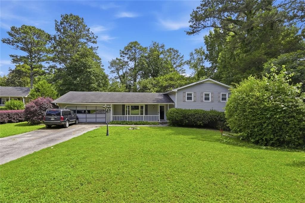 4 bedroom, 3 bathroom, 2,614 sq ft single family residence sold at 4118 Rocky Ledge Way, Snellville, GA 30039