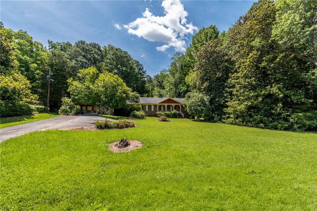3 bedroom, 2 bathroom, 1,482 sq ft single family residence for sale at 2218 Young Road, Stone Mountain, GA 30088 — photo 6