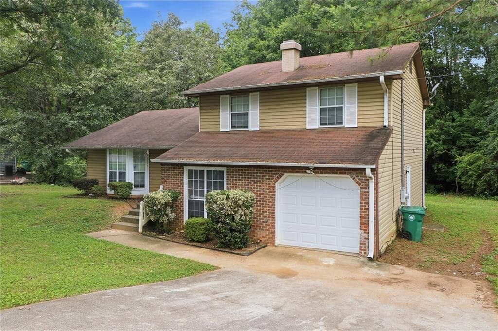 4 bedroom, 3 bathroom, 1,800 sq ft single family residence for sale at 5200 Great Meadows Road, Lithonia, GA 30038 — photo 1 of 25