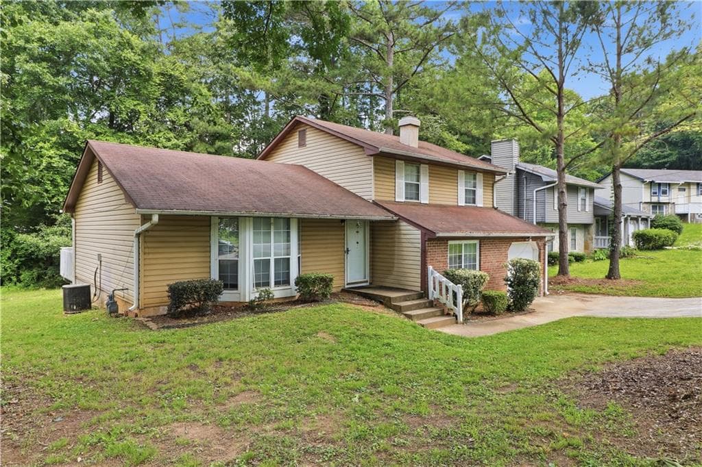 4 bedroom, 3 bathroom, 1,800 sq ft single family residence for sale at 5200 Great Meadows Road, Lithonia, GA 30038 — photo 2