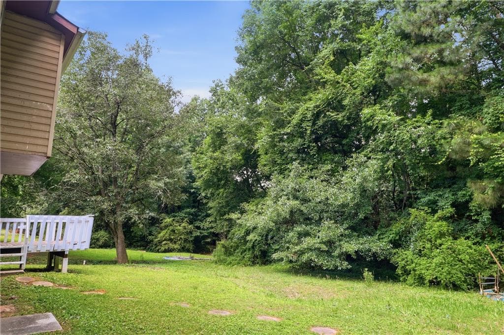 4 bedroom, 3 bathroom, 1,800 sq ft single family residence for sale at 5200 Great Meadows Road, Lithonia, GA 30038 — photo 4