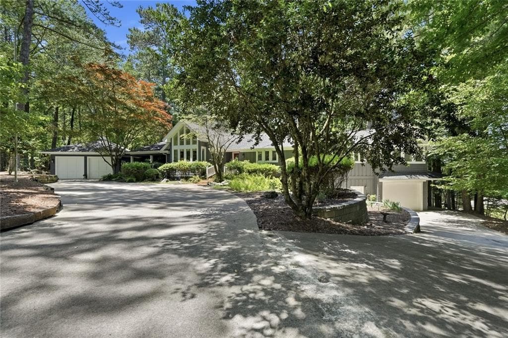 3 bedroom, 4 bathroom, 4,370 sq ft single family residence for sale at 6504 Yacht Club Road, Flowery Branch, GA 30542
