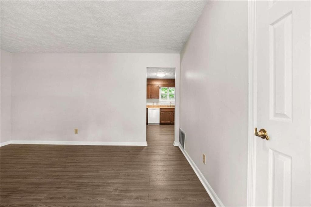 3 bedroom, 2 bathroom, 1,144 sq ft single family residence for sale at 6988 Tan Bark Court, Riverdale, GA 30296 — photo 4