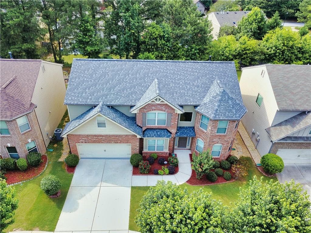 5 bedroom, 3 bathroom, 2,636 sq ft single family residence for sale at 1721 Bridle Road, Lawrenceville, GA 30043 — photo 5