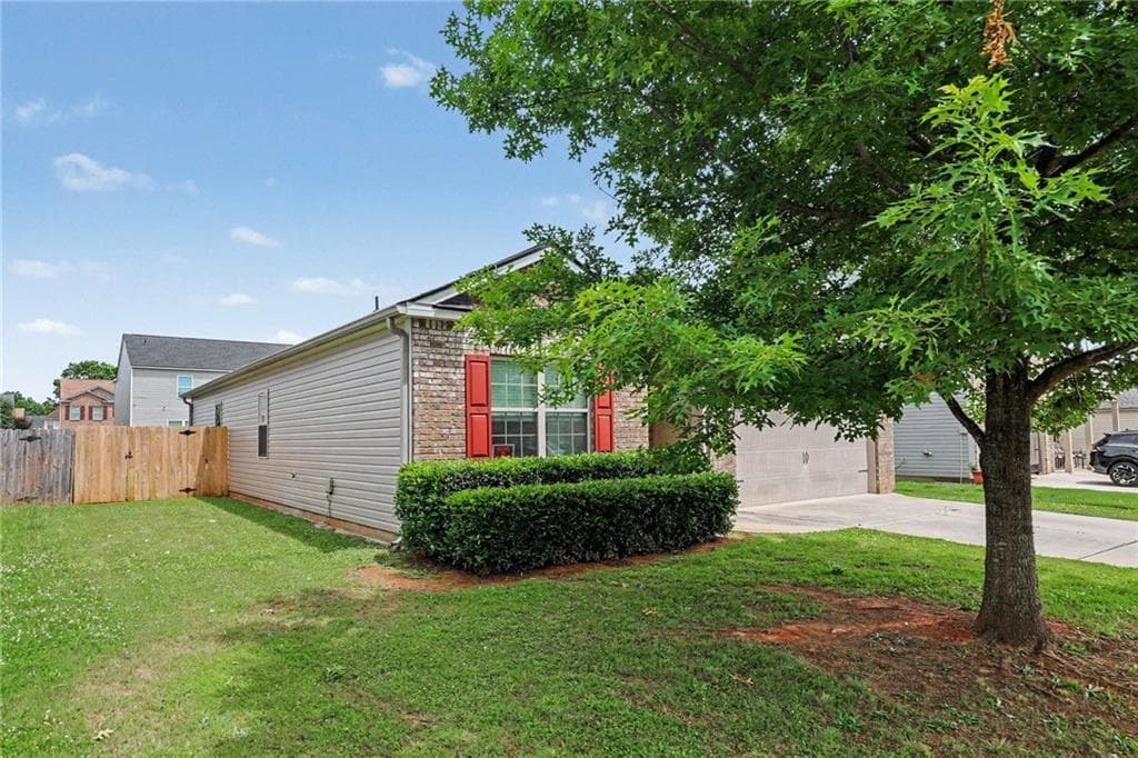 4 bedroom, 2 bathroom, 1,855 sq ft single family residence for sale at 1886 Osprey Drive, Hampton, GA 30228 — photo 3