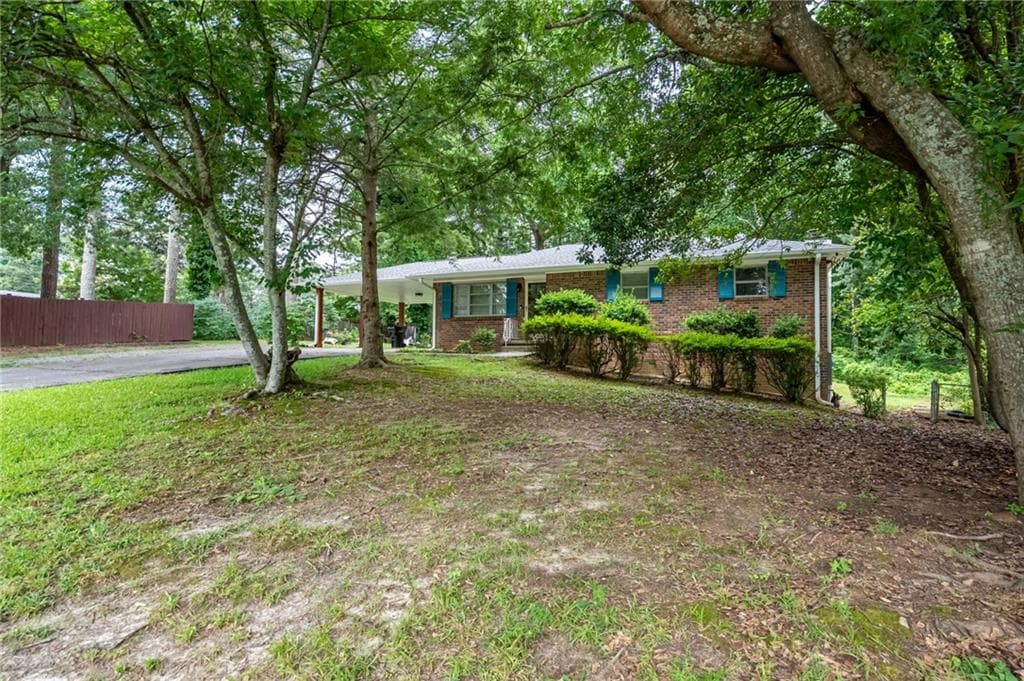 4 bedroom, 3 bathroom, 2,052 sq ft single family residence for sale at 3430 Hillbrook Court, Marietta, GA 30008 — photo 4