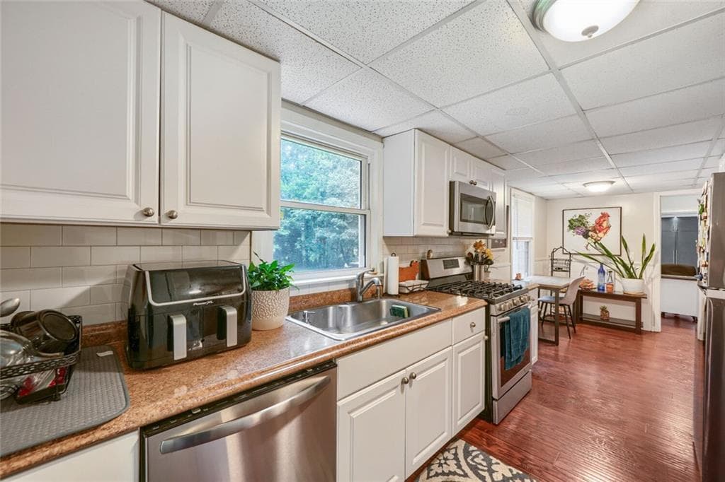 4 bedroom, 3 bathroom, 2,486 sq ft single family residence for sale at 5042 Stephens Drive, Lilburn, GA 30047 — photo 8