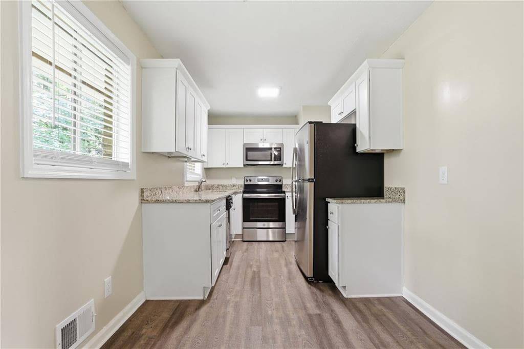 4 bedroom, 2 bathroom, 1,434 sq ft single family residence for sale at 4505 Wonder Valley Trail, Decatur, GA 30034 — photo 7